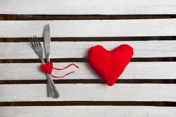 Concept image for Valentine dining, fork, spoon and red heart — Stock Photo, Image