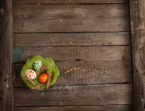 Easter eggs on wooden background — Stock Photo, Image