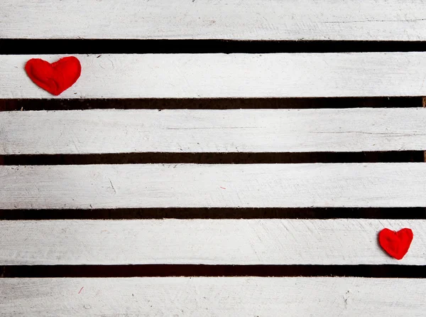 Two red hearts on white wooden background — Stock Photo, Image