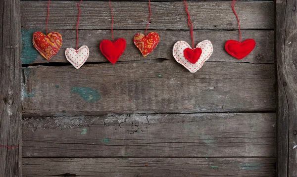 Muchos corazones sobre fondo de madera —  Fotos de Stock