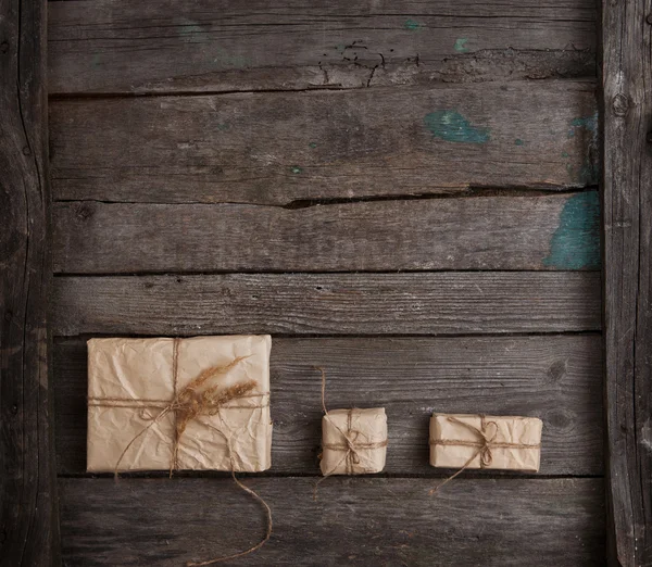 Vintage gift on wooden background — Stock Photo, Image