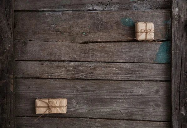 Regalo vintage su sfondo di legno — Foto Stock