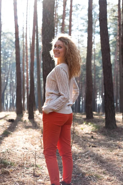 Redhead fashionable woman in the forest — Stock Photo, Image