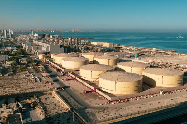Middle East water and gas containers along the coastline for gas, water and oil concepts. Industrial zone.