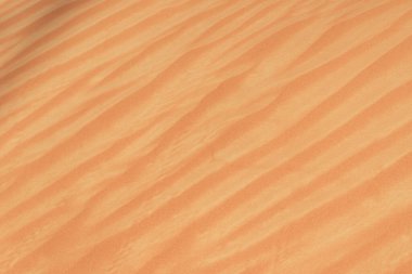 Close up of the sand designs in the beautiful sunshine in the United Arab Emirates.