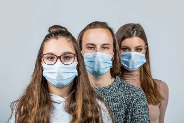 Group of people wearing protective medical mask for protection from virus disease. Group of people with protective masks. Crowd of people wearing medical masks. Coronavirus epidemic concept