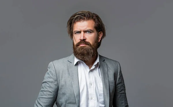 Portrait of handsome bearded man in suit — Stock Photo, Image