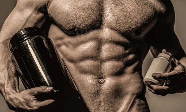 Steroid, olahraga vitamin, doping, anabolik, protein. Bodybuilder, binaraga. Pemain olahraga, otot, atlet, triceps. Kaukasia atletik, enam pak, otot dada, triceps. Tubuh pria yang indah, ab — Stok Foto