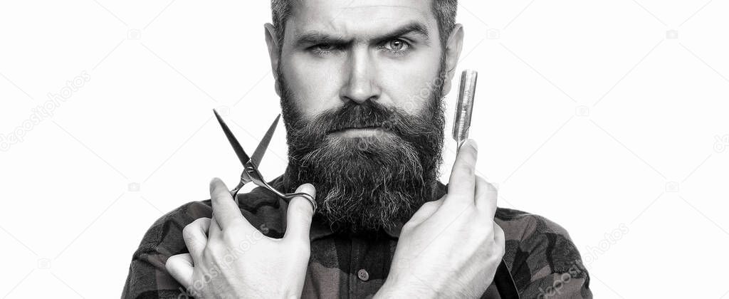 Mens haircut in barber shop. Barber scissors and straight razor, barber shop. Mens haircut, shaving. Male in barbershop