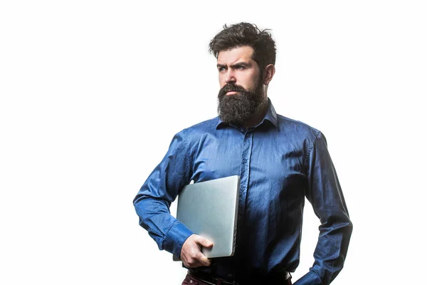 Holding laptop computer. Serious handsome bearded man worker laptop. Bearded male businessman holding a computer in his hands isolated on white background. Young businessman using his laptop, pc —  Fotos de Stock