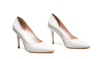 Fashionable women shoes isolated on white background. Stylish classic women leather shoe. White high heel women shoes on white background. White shoe for women. Beauty and fashion concept