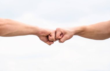 Fist Bump. Clash of two fists. Concept of confrontation, competition. Gesture of giving respect or approval. Teamwork and friendship. Partnership concept. clipart