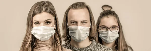 Crowd of people wearing medical masks. Coronavirus epidemic concept. Group of people wearing protective medical mask for protection from virus disease — Stock Photo, Image