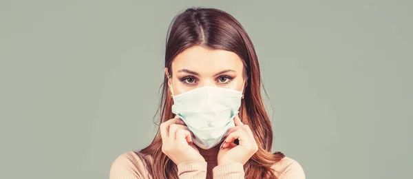 Woman wearing surgical mask for corona virus. Woman wearing an anti virus protection mask. Woman wearing medical face mask