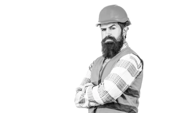 인간을 건설하는 사람, 산업. 건축 제복을 입은 노동자. 건축가. 수염을 기르고 헬멧이나 딱딱 한 모자를 쓰고 일하는 남자. 흑백 — 스톡 사진