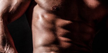 Torso six packs attractive. Six pack abs. Strong man with torso. Sexy muscular man. Sensual mans body, abc. Torso with six packs looks attractive on black background