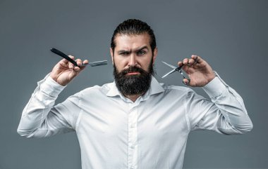 Sakallı adam, sakallı erkek. Şık erkek sakalı portresi. Berber makası ve ustura, berber dükkanı. Klasik berber, tıraş..
