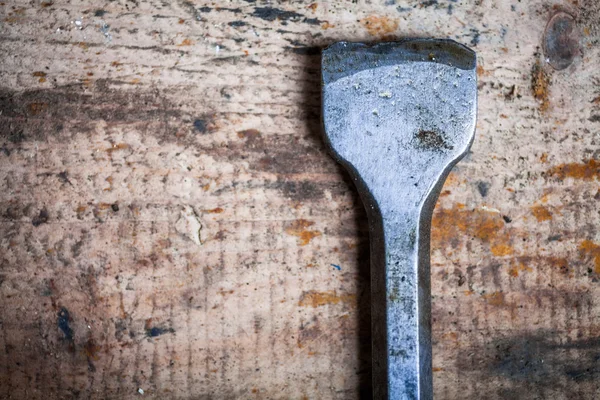 Chisel on wooden plank — Stock Photo, Image