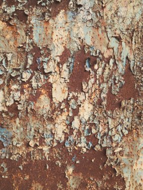 Paslı metal bir yüzeyi mavi boyayla yakın çekim yap..