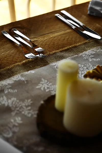 Forks and knives on a table — Stock Photo, Image