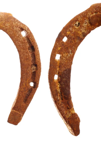 Rusty horse shoes on qhite — Stock Photo, Image