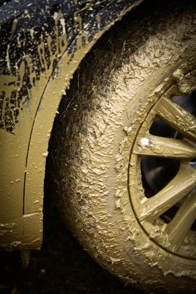 Muddy car's wheel — Stock Photo, Image