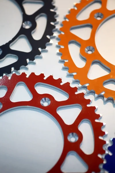 Colored motorcycle sprockets — Stock Photo, Image