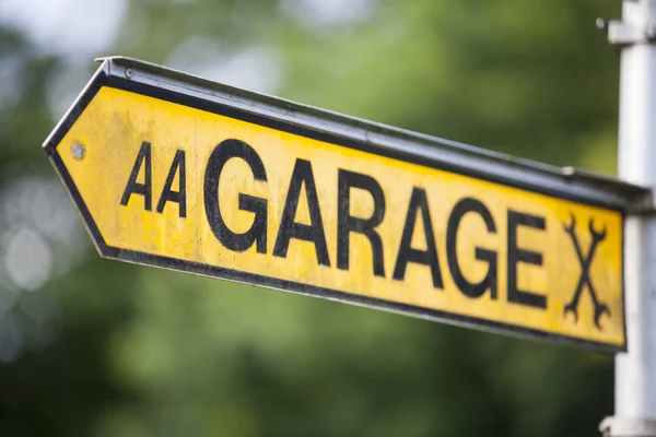 Garage ukazatele znaménko — Stock fotografie