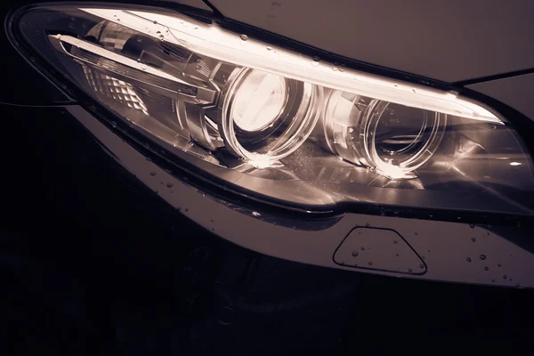 Auto koplamp detail — Stockfoto