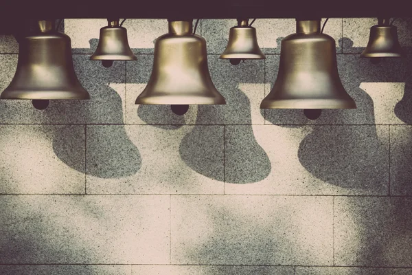 Various bells in a row — Stock Photo, Image