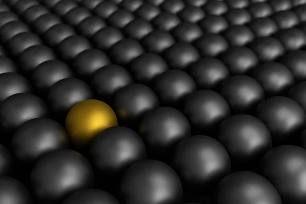 Different golden ball among black balls — Stock Photo, Image