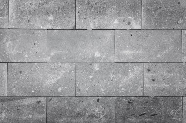 Açık gri, arka plan için duvar dekorasyonunda beyaz tuğlalar.