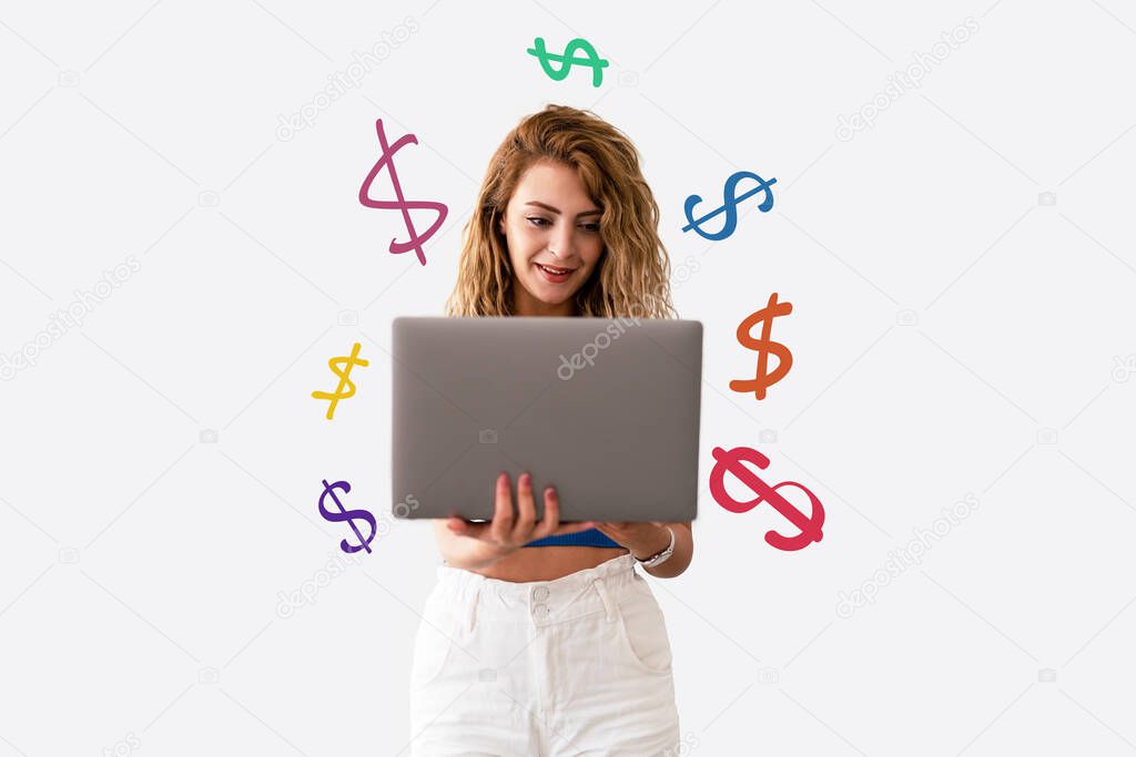 Young , beautiful woman hold laptop and become happy, while she see the results on the screen. Victory and success concept