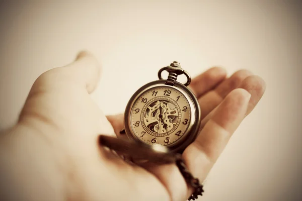 Male hand holding stopwatch — Stock Photo, Image