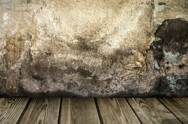 Grunge wall with wooden plank floor — Stock Photo, Image