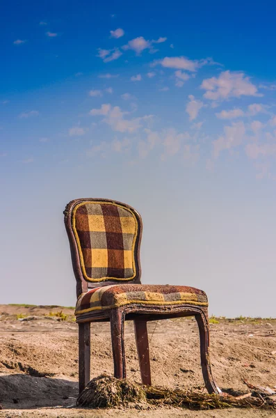 Wooden chair alone on Sand — Stock Photo, Image