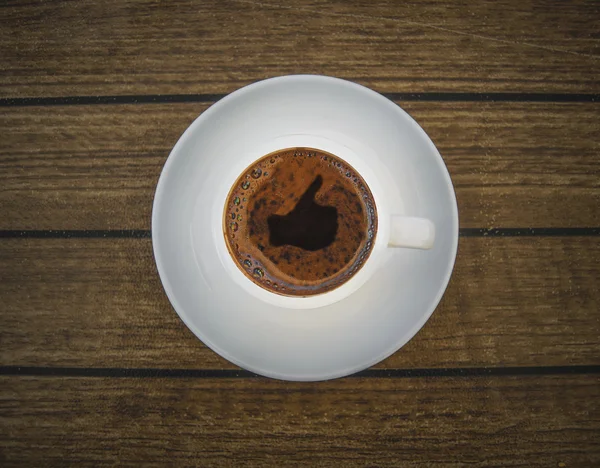 Xícara de café com sinal semelhante — Fotografia de Stock