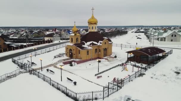 Orthodox church in winter. aerial drone shooting — Stock Video