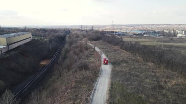 Movement of a fire truck across the field. moscow russia 25 april 2021. — Stock Video