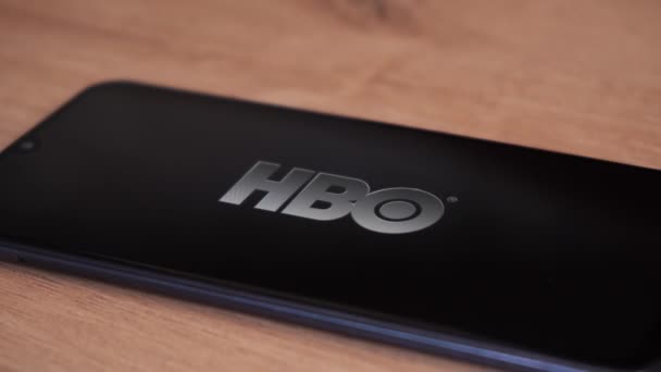 HBO logo displayed on the phone. Moscow Russia May 9, 2021 — Stock video