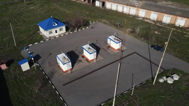 Drone movement near the old gas station — Stok video