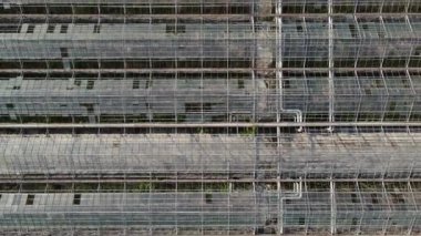 movement of the camera upward from the greenhouses. aerial shooting