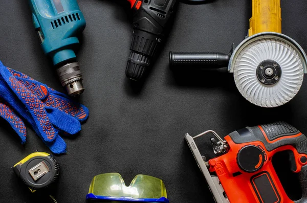 A remonic set of tools. Electrical tools for repair in the house and office. Business toolkit