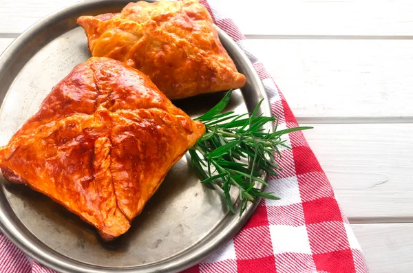 Fresh homemade pastries are on an iron tray — Stock Photo, Image