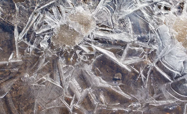 Frosty pattern on the surface of a frozen puddle. — Φωτογραφία Αρχείου