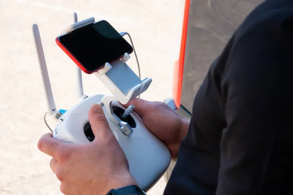 Close Drone Pilot Hands Controlling Aircraft Remote Control Transmitter Outdoors — Stock fotografie