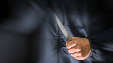 Street robber with a knife - killer person with sharp knife about to commit a homicide, murder scenery clipart