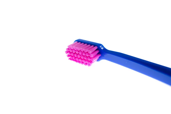 Escova de dentes isolada sobre fundo branco. De perto. . — Fotografia de Stock