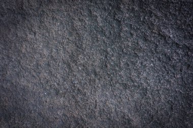 Taş zemin. Granitin doğal yapısı. Kenarlarda hafif titreşim.