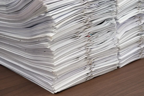 Pile of documents with clips on desk stack up — Stock Photo, Image